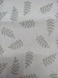 Printed green leaves on cotton and linen fabric Printed green leaves on cotton and linen fabric